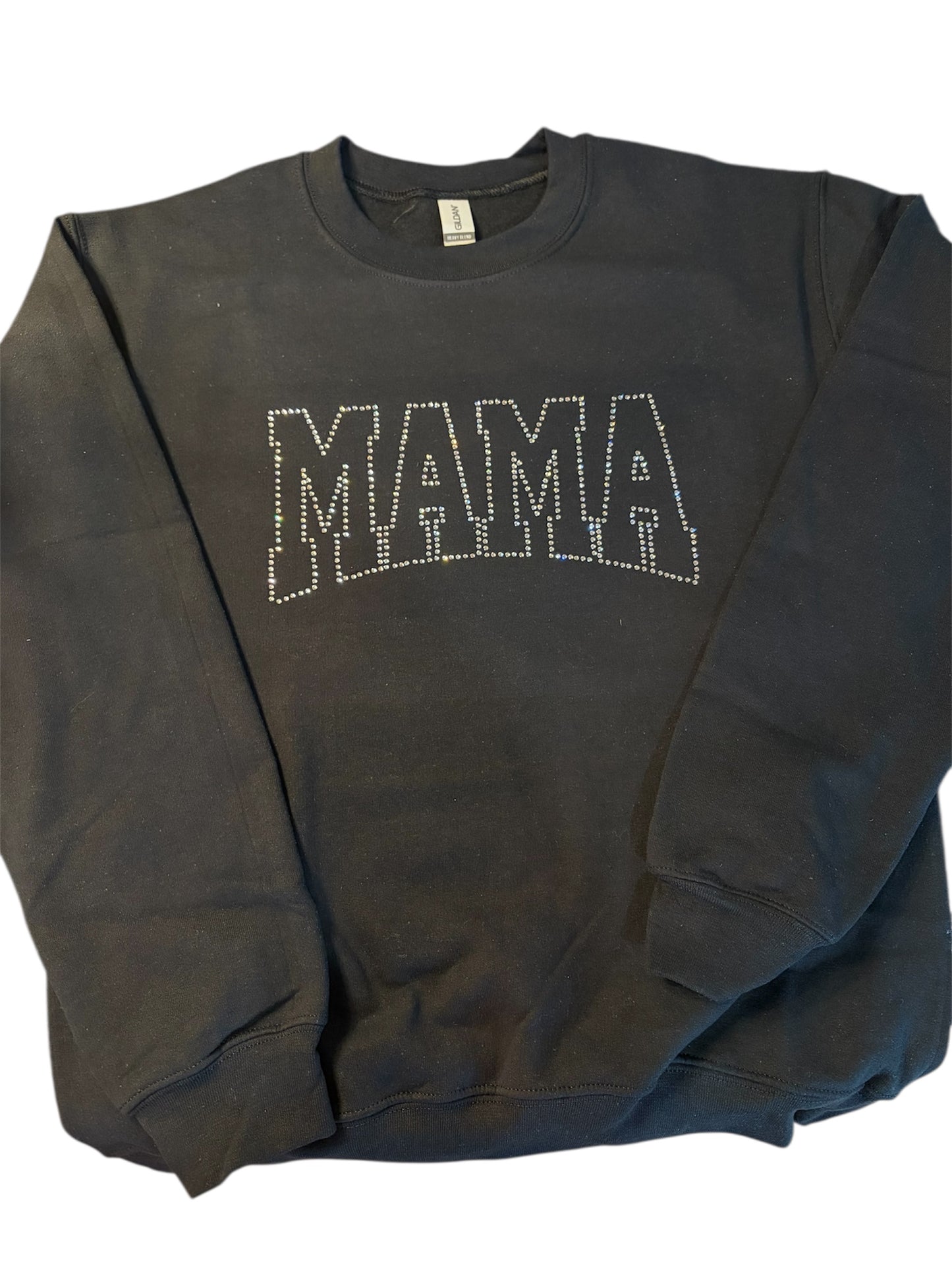 Black sweatshirt with 'MAMA' rhinestone text on a white background
