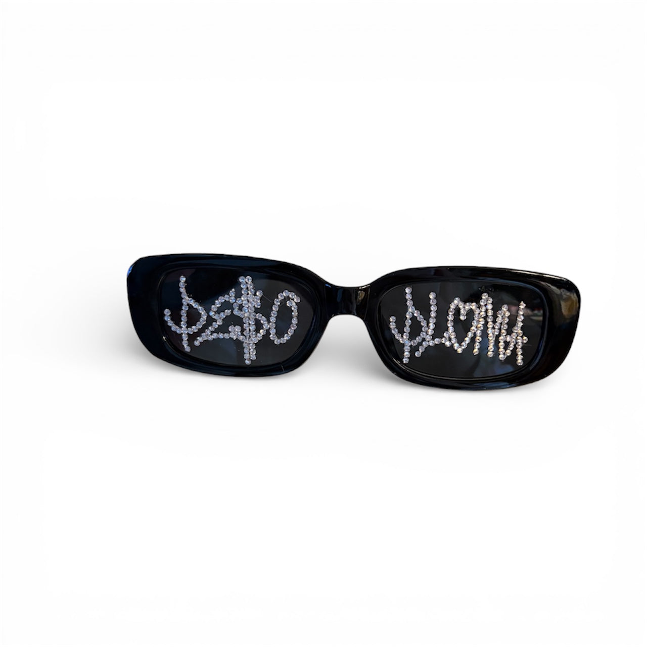 Black sunglasses with rhinestone designs on a white background